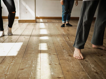 Low section of people on floor