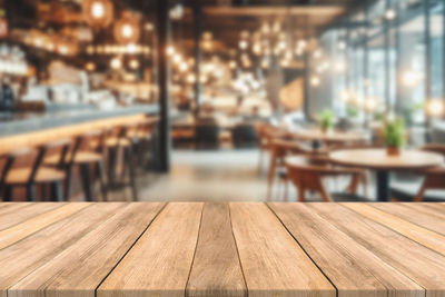 Close-up of wooden table in restaurant