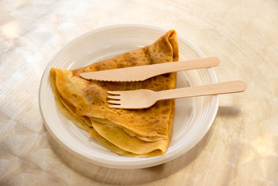 High angle view of bread in plate on table