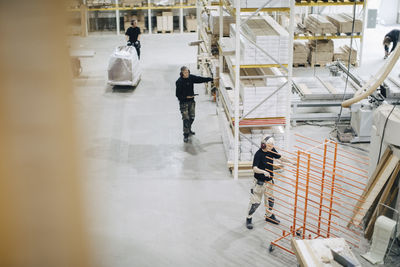 High angle view of people working in building