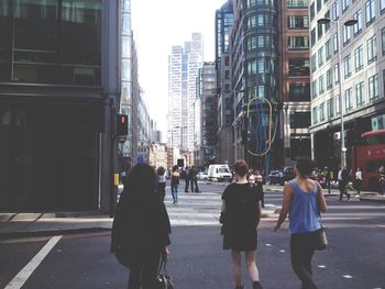 People walking on city street