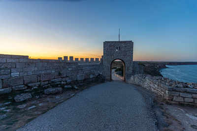 View of historical building against sky during sunset