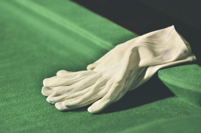 Close-up of gloves on table