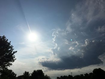 Low angle view of vapor trails in sky