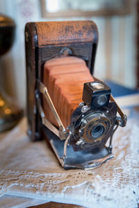 Close-up of vintage camera on table