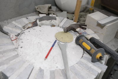 High angle view of messy lying down on table