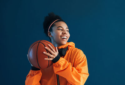 Young man playing basketball