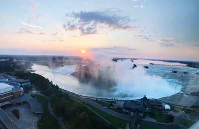 High angle view of city during sunset