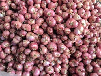 Full frame shot of onions for sale at market stall