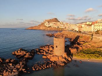 Scenic view of sea and rocks against sky