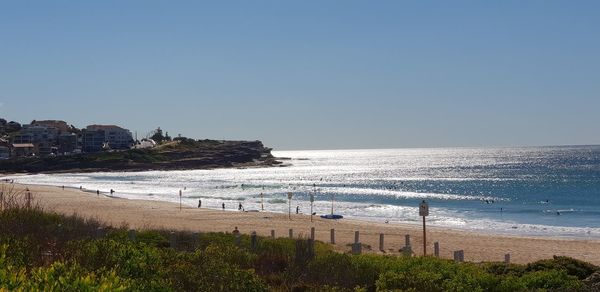 Scenic view of sea against clear sky