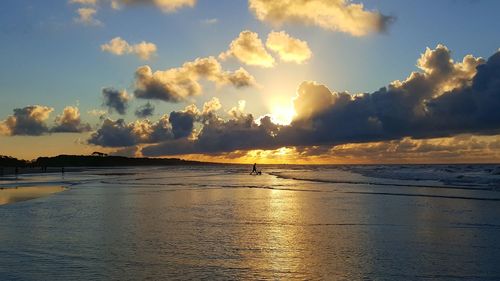 Scenic shot of calm sea at sunset