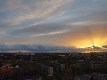 High angle view of buildings against sky at sunset