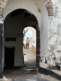 People standing at entrance of building