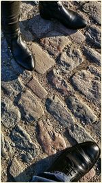 Low section of woman standing on ground