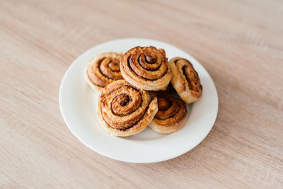 High angle view of cookies in plate on table