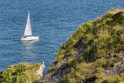 High angle view of sailboat sailing on sea