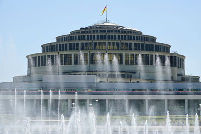 Low angle view of fountain against clear sky