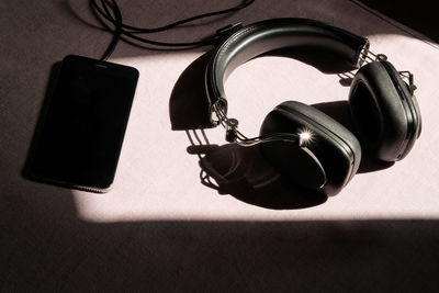 High angle view of smart phone on table