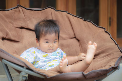 Portrait of cute baby at home