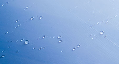 High angle view of water drops on table