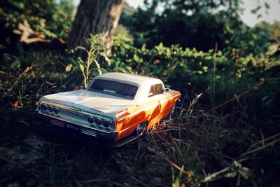 Close-up of toy car on field