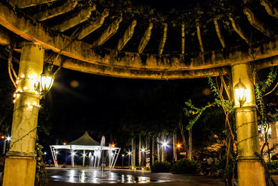 Illuminated lantern at night