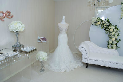 White flower vase on table at home