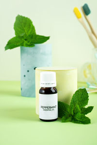 Close-up of medicine bottle on table