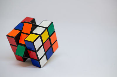 Close-up of multi colored toy against white background