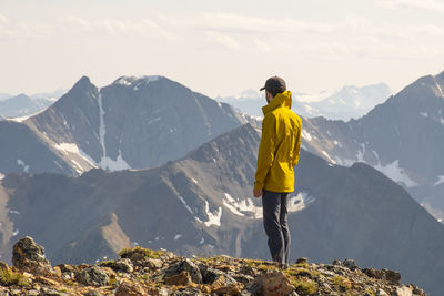 Male hiker on the summit of mt. brewer east kootenay bb