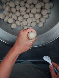 Cropped image of person holding ice cream