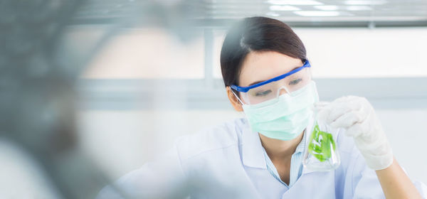 Portrait of teenage girl wearing mask