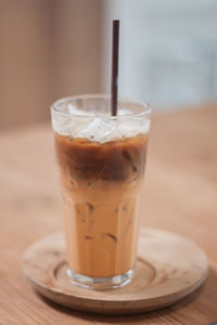 Close-up of coffee served on table