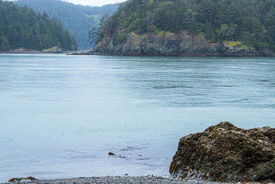 Scenic view of sea against mountain