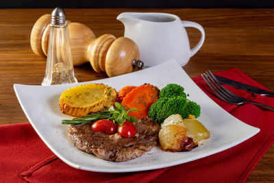 Close-up of breakfast served on table