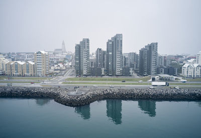 Modern coastal city with embankment