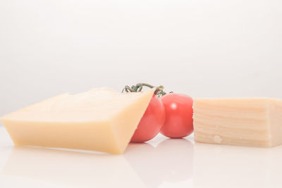 Close-up of cake against white background