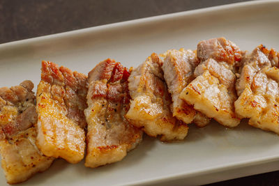 High angle view of meat in plate on table