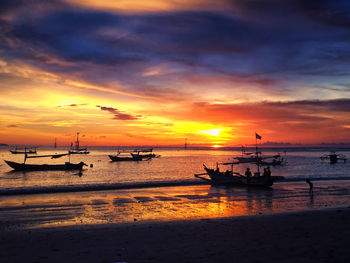 Scenic view of sea against dramatic sky