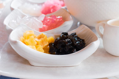 High angle view of fruits in bowl on table