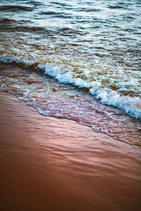 Full frame shot of waves rushing towards shore