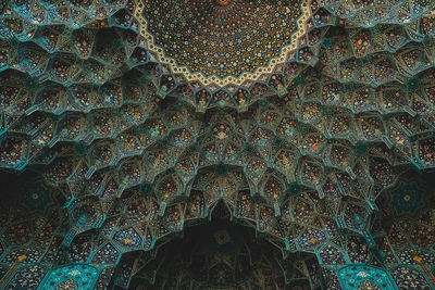 Low angle view of illuminated ceiling of building