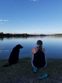 Fur baby and mum having a moment by lake