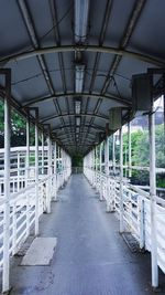 Empty corridor along buildings