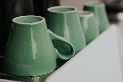 Close-up of containers on table