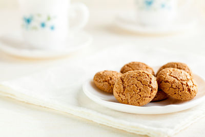 View of cookies in plate on table