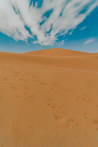 Scenic view of desert against sky