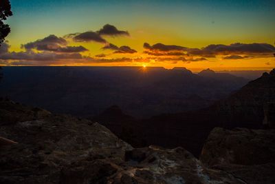 Scenic view of mountains against sky during sunset