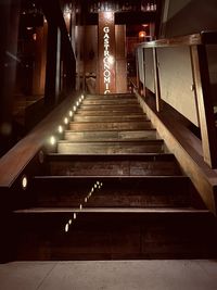 Low angle view of illuminated staircase in building